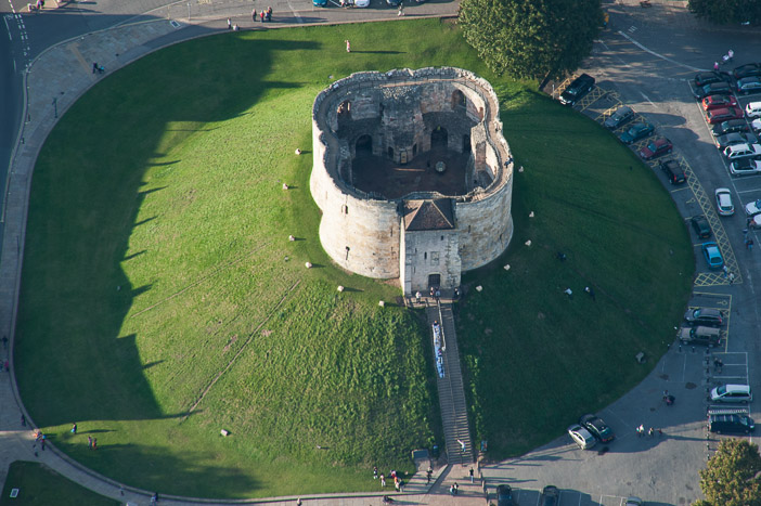 Aerial picture of the keep of&nbsp;York&nbsp;Castle&nbsp;in the centre of the city of&nbsp;York&nbsp;over 9 centuries old is one of the most popular attractions and you may float over it on our hot air balloon flights.