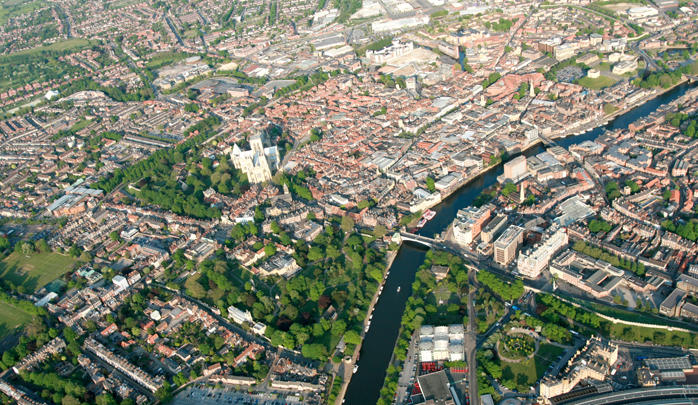 York Cathedral, or the Minster as it is locally known and the River Ouse are clearly visible on this great aerial picture of the city of York from a hot air balloon. Soon after take off your wicker basket will provide a superb steady platform to take pictures on your hot air balloon ride over Yorkshire.